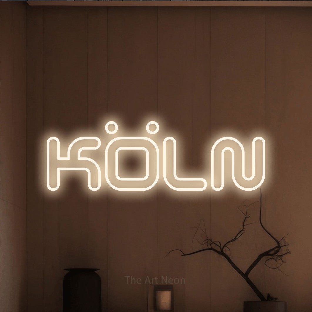 LED neon sign reading “KÖLN”, arranged in a single line.