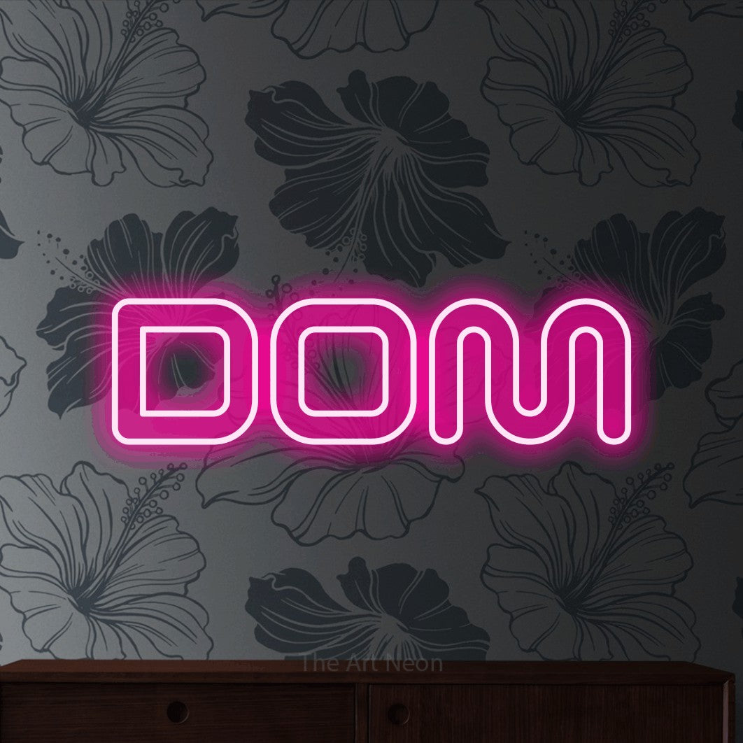 LED neon sign reading “DOM”, arranged in a single line.