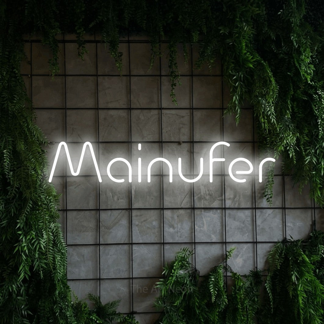 LED neon sign reading “Mainufer”, arranged in a single line.