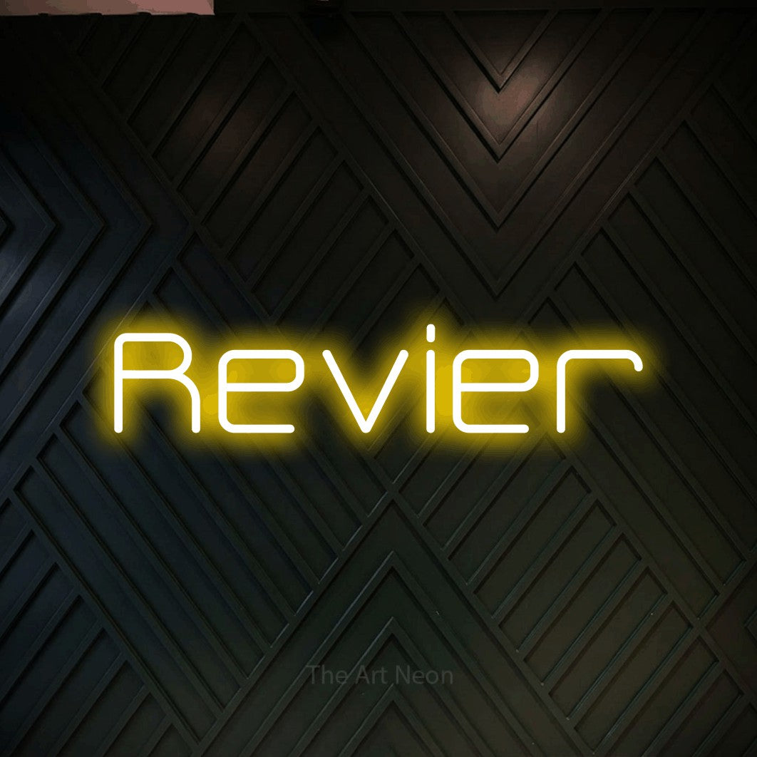LED neon sign reading “Revier”, arranged in a single line.