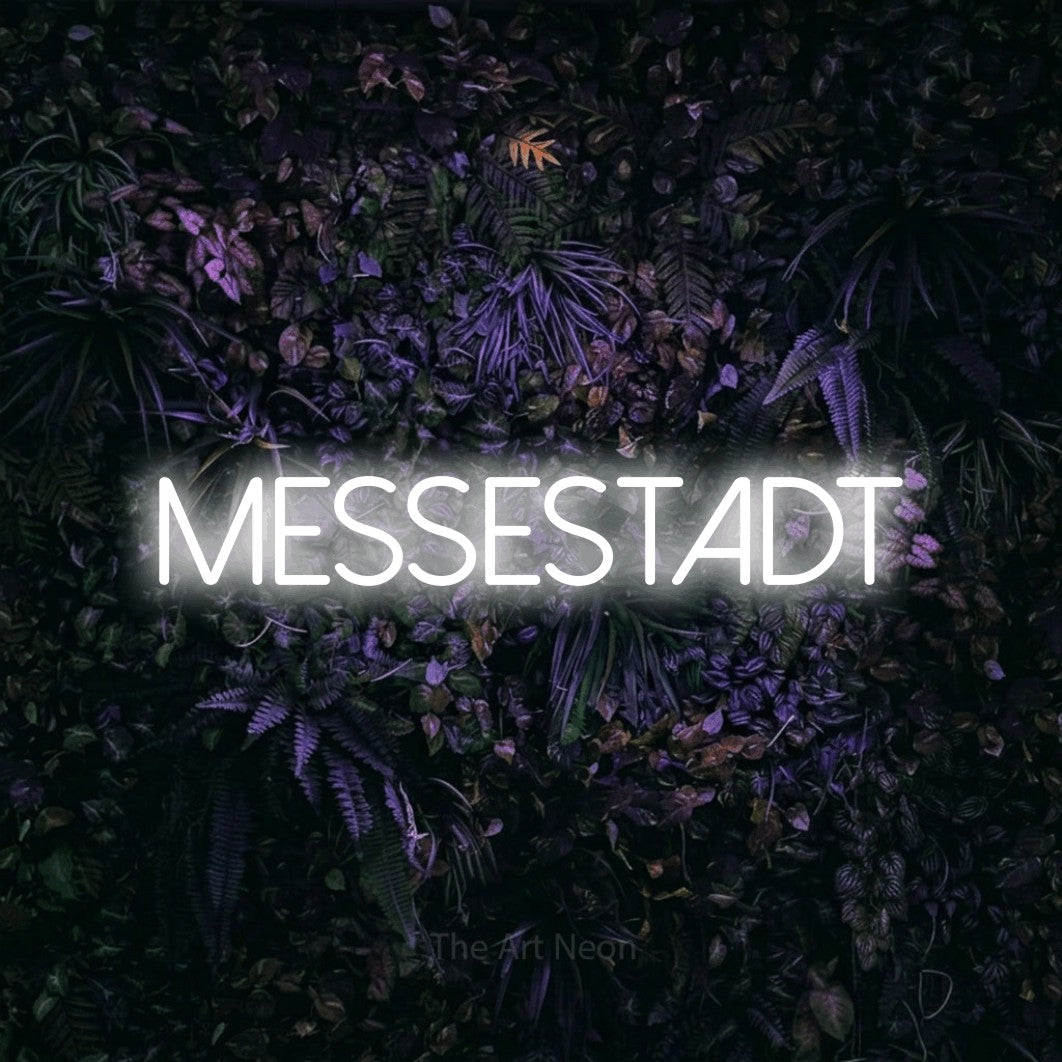 LED neon sign reading “Messestadt”, arranged in a single line.