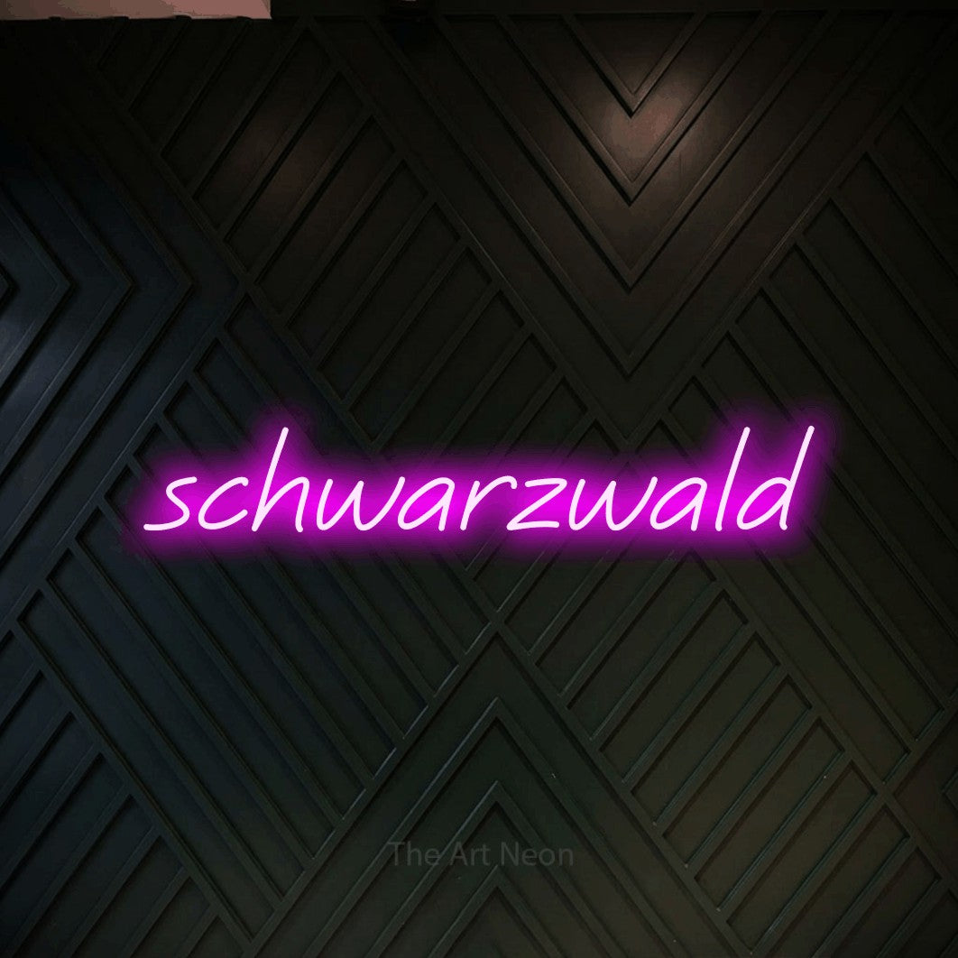 LED neon sign reading “schwarzwald”, arranged in a single line.