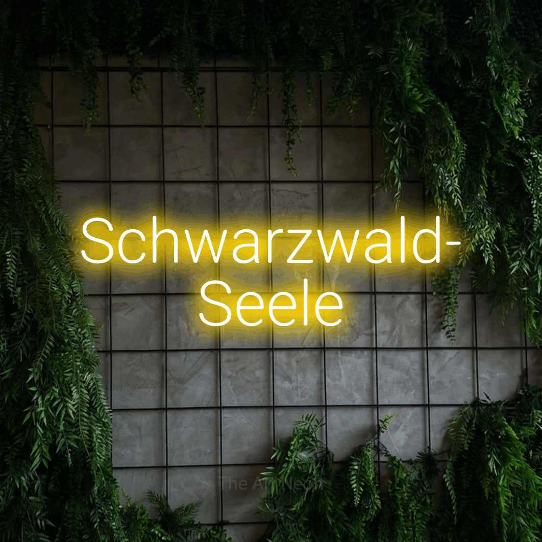 LED neon sign reading “Schwarzwald- Seele”, arranged in 2 lines.