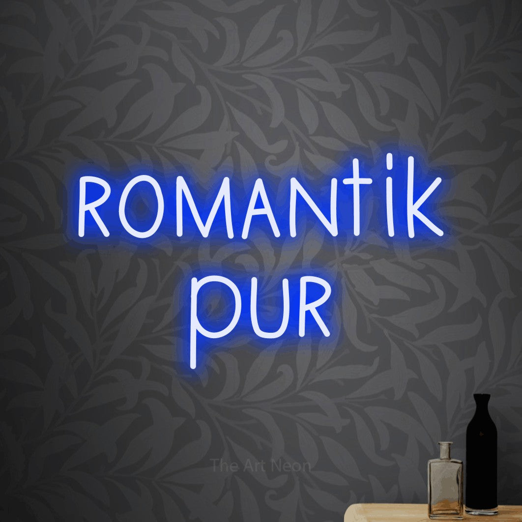 LED neon sign reading “romantik pur”, arranged in 2 lines.