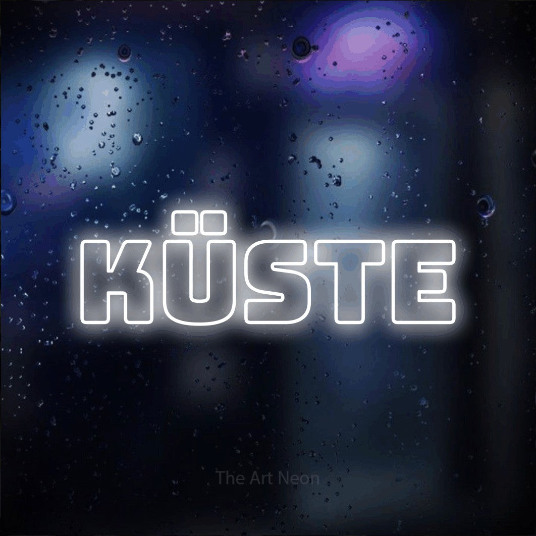 LED neon sign reading “küste”, arranged in a single line.