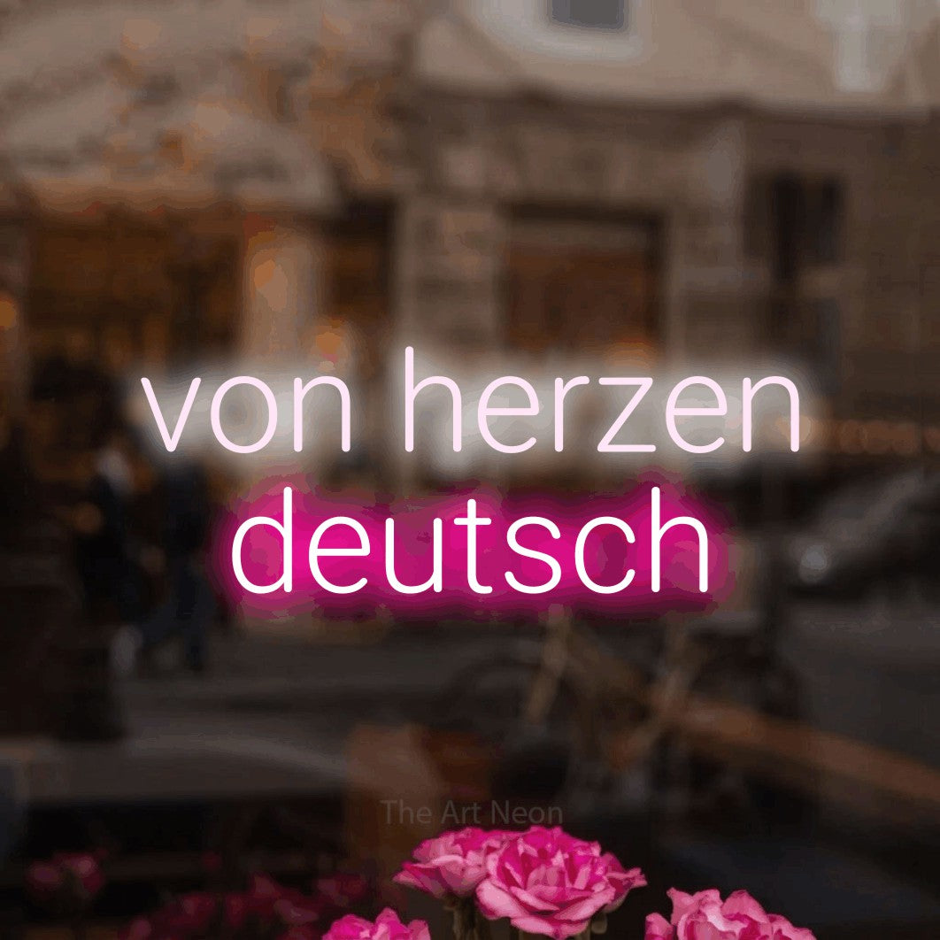 LED neon sign reading “von herzen deutsch”, arranged in 2 lines.