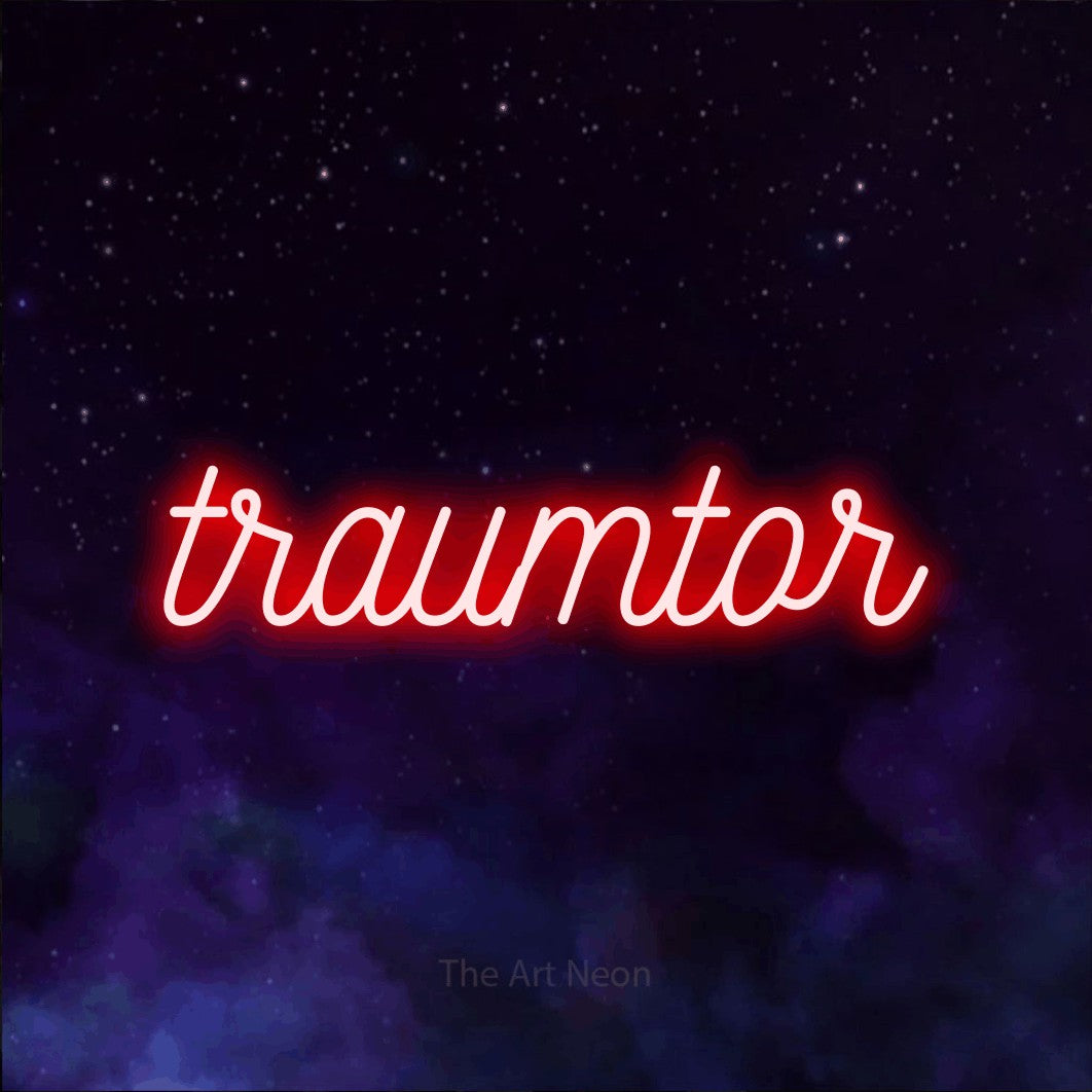 LED neon sign reading “traumtor”, arranged in a single line.