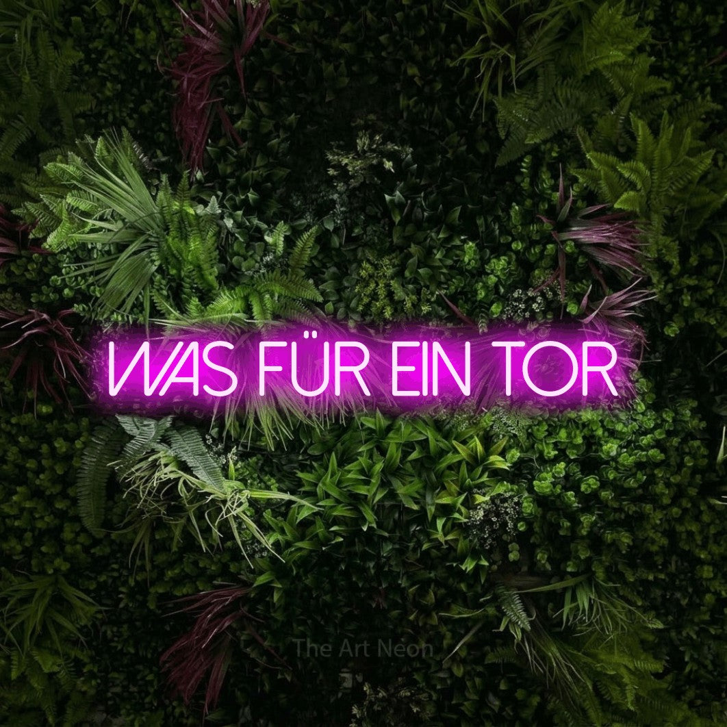 LED neon sign reading “was für ein tor”, arranged in a single line.