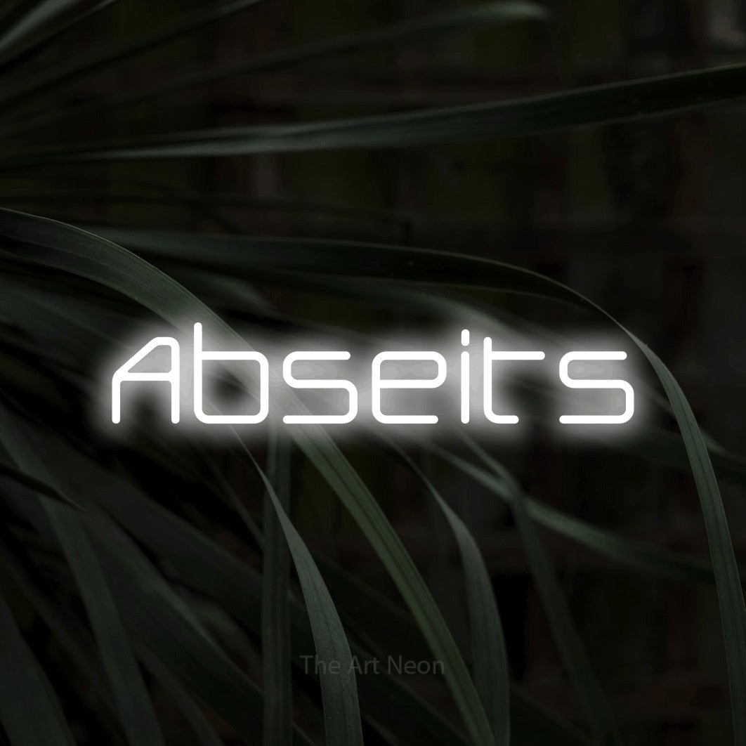 LED neon sign reading “Abseits”, arranged in a single line.
