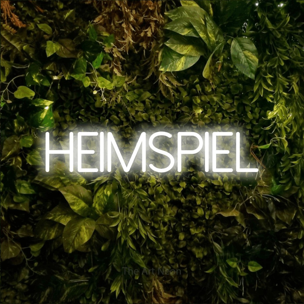 LED neon sign reading “HEIMSPIEL”, arranged in a single line.