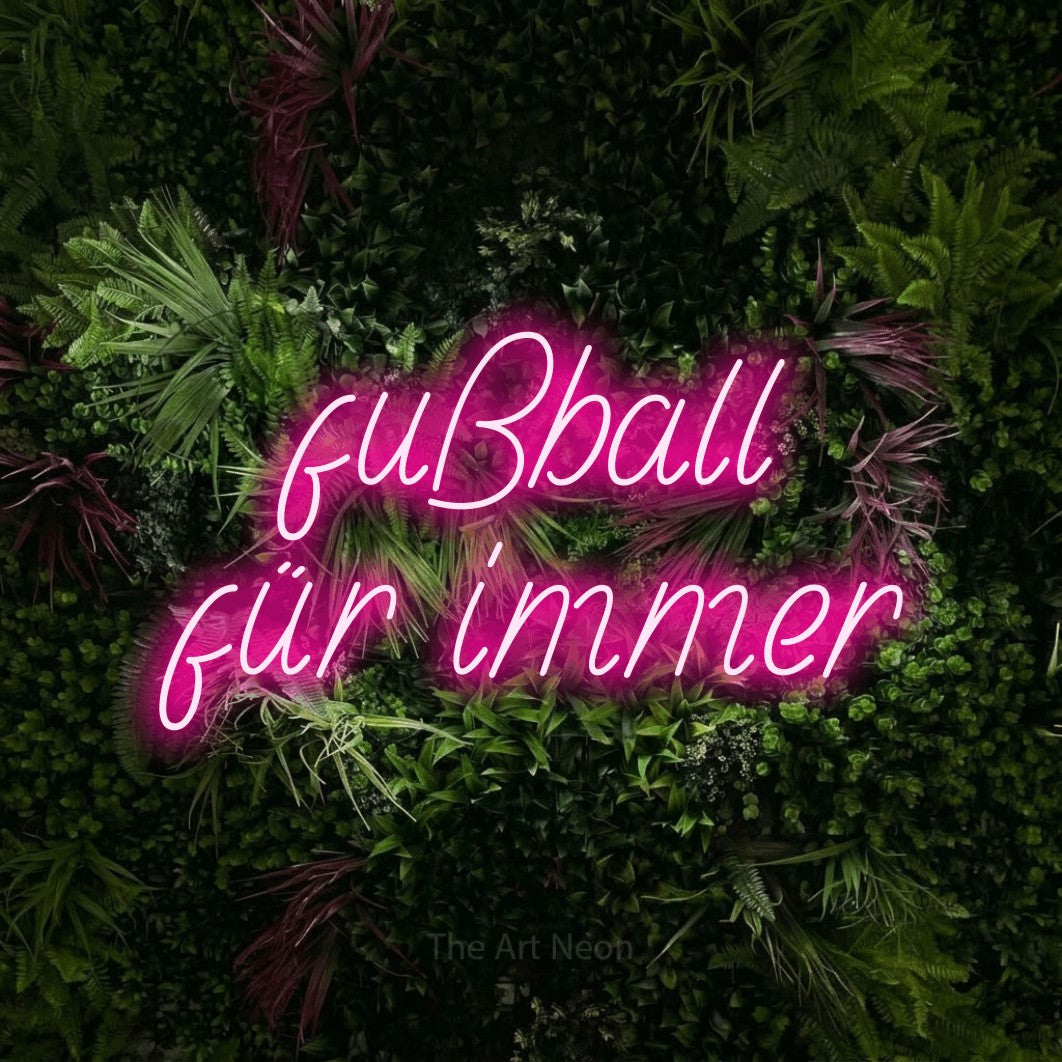 LED neon sign reading “fußball für immer”, arranged in 2 lines.