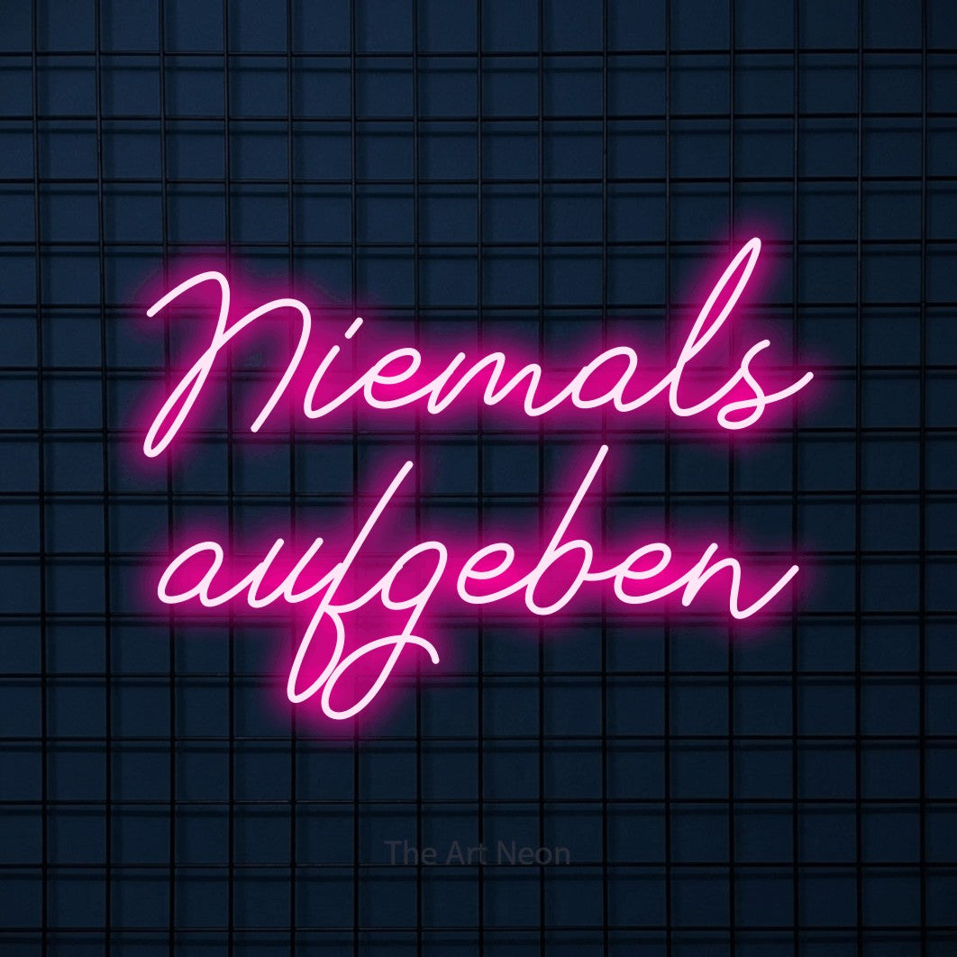 LED neon sign reading “Niemals aufgeben”, arranged in 2 lines.