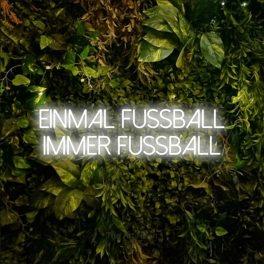 LED neon sign reading “EINMAL FUSSBALL IMMER FUSSBALL”, arranged in 2 lines.