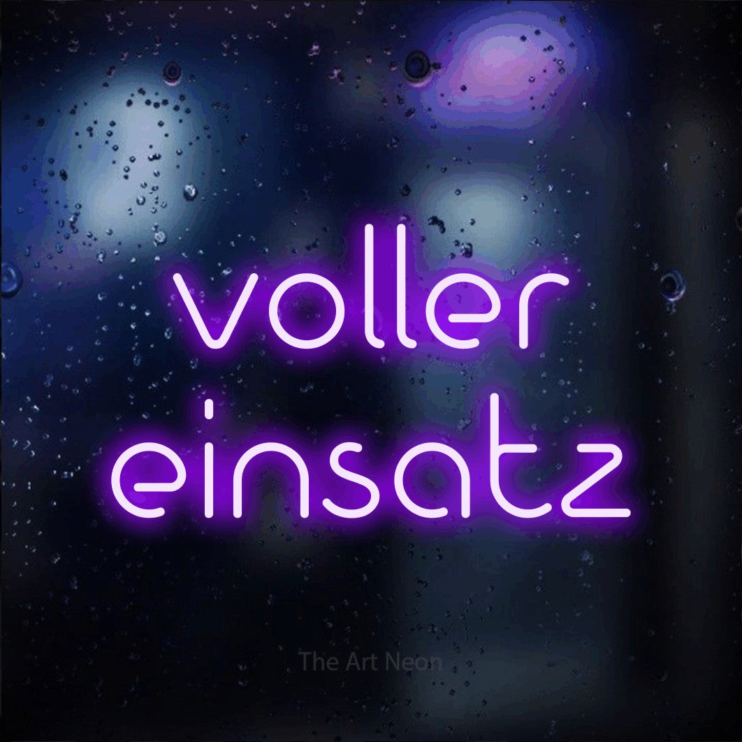 LED neon sign reading “voller einsatz”, arranged in 2 lines.