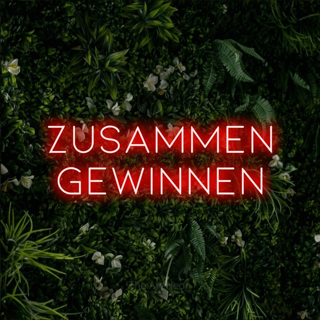 LED neon sign reading “Zusammen gewinnen”, arranged in 2 lines.