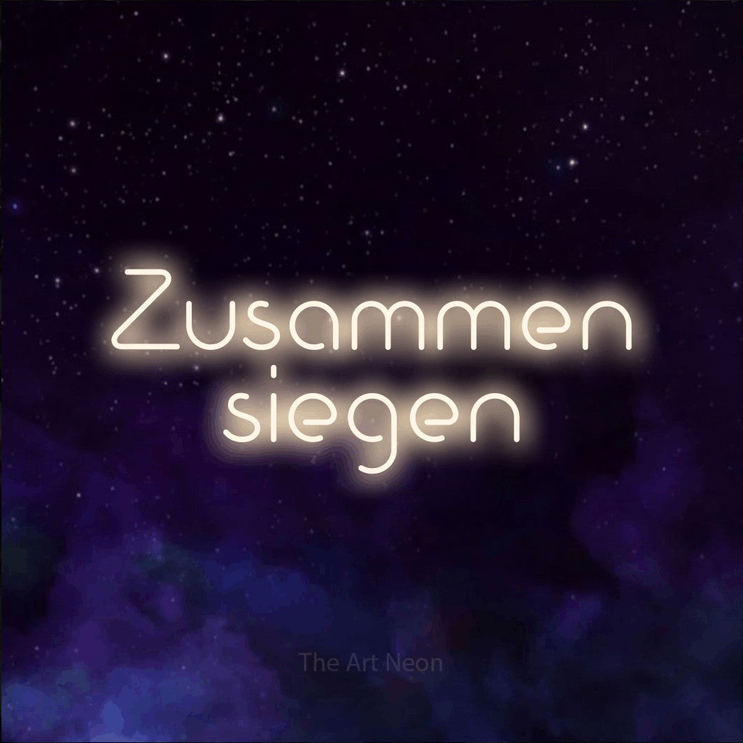 LED neon sign reading “Zusammen siegen”, arranged in 2 lines.