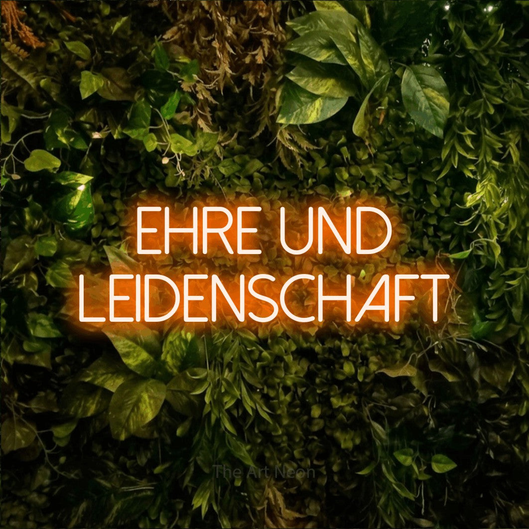 LED neon sign reading “EHRE UND LEIDENSCHAFT”, arranged in 2 lines.