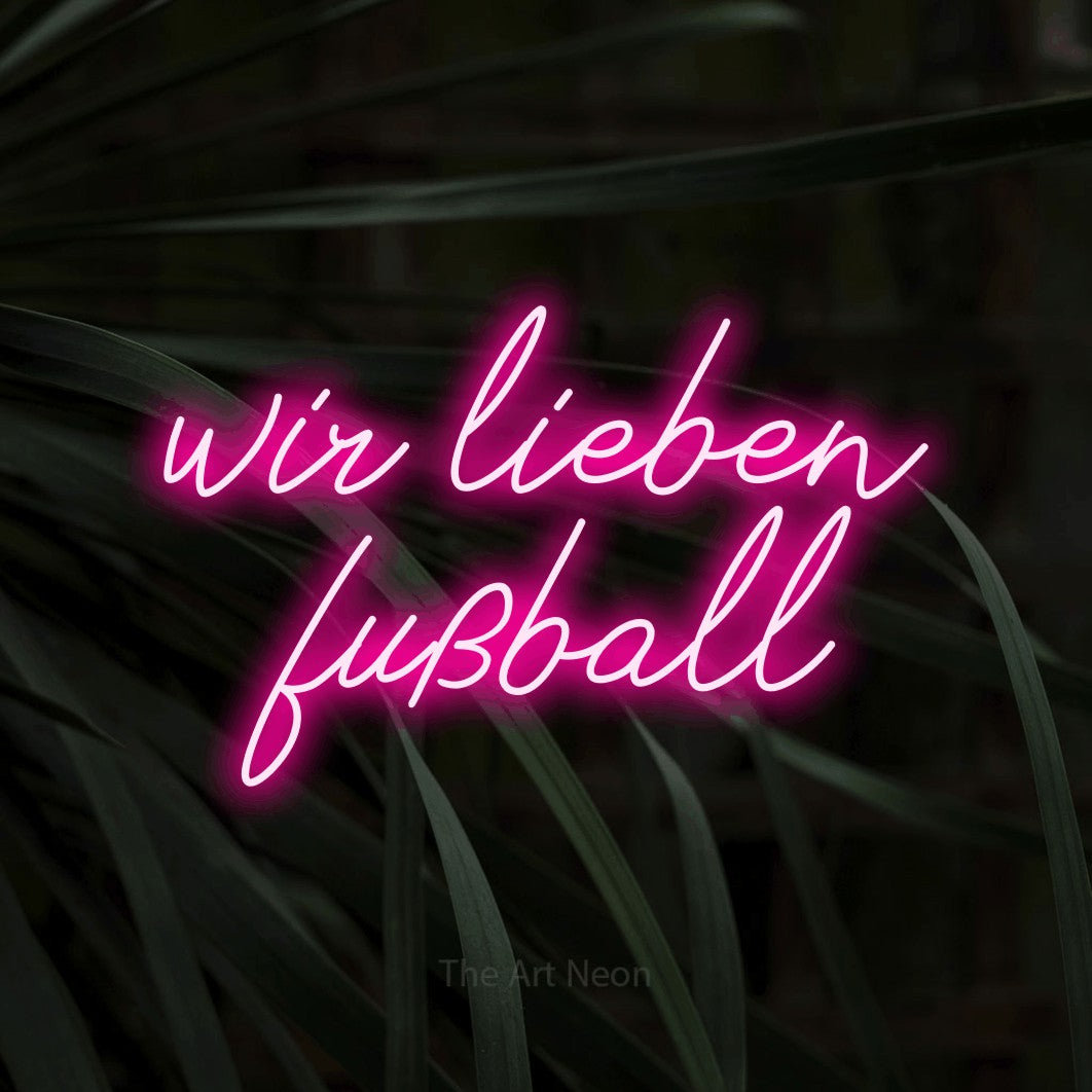 LED neon sign reading “wir lieben fußball”, arranged in 2 lines.