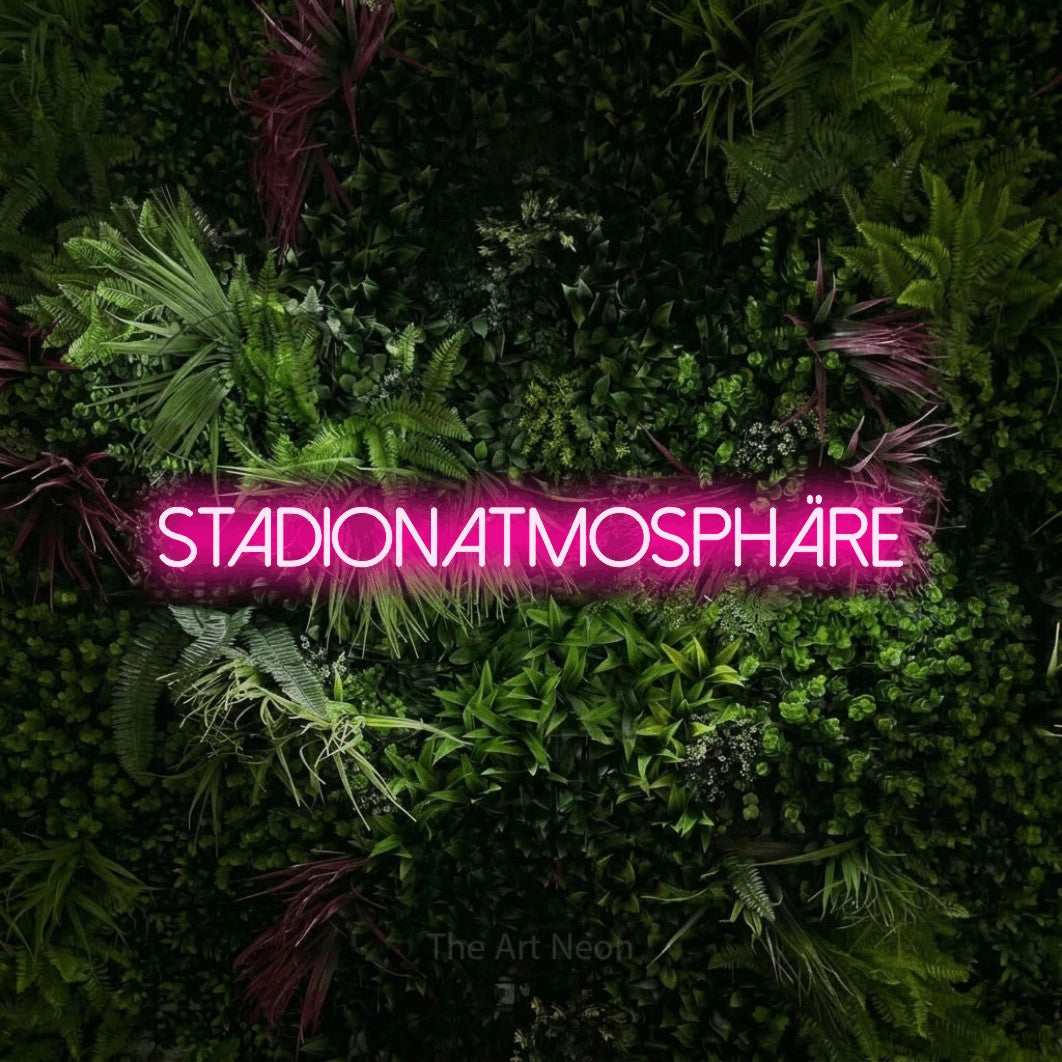 LED neon sign reading “Stadionatmosphäre”, arranged in a single line.