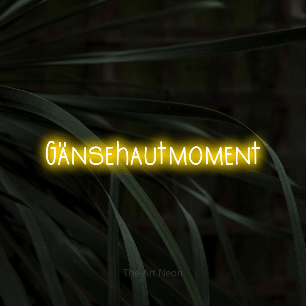 LED neon sign reading “Gänsehautmoment”, arranged in a single line.