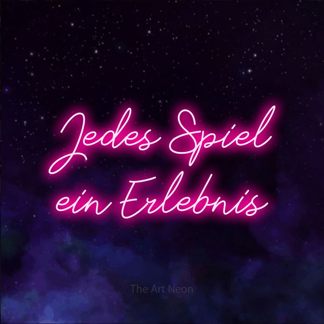 LED neon sign reading “Jedes Spiel ein Erlebnis”, arranged in 2 lines.