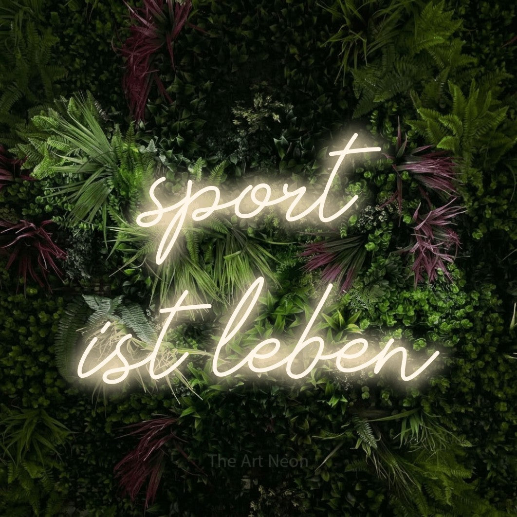 LED neon sign reading “sport ist leben”, arranged in 2 lines.