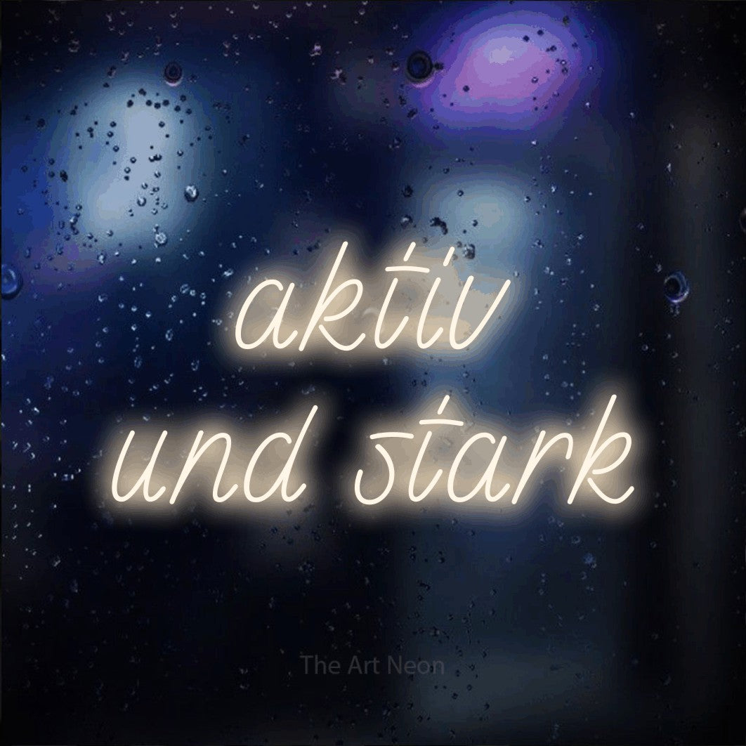 LED neon sign reading “aktiv und stark”, arranged in 2 lines.