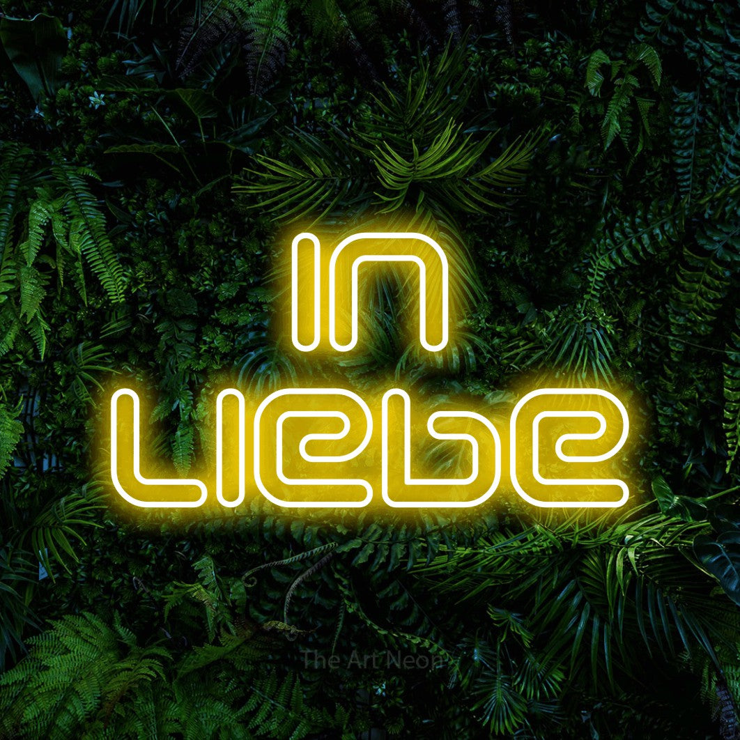 LED neon sign reading “In Liebe”, arranged in 2 lines.