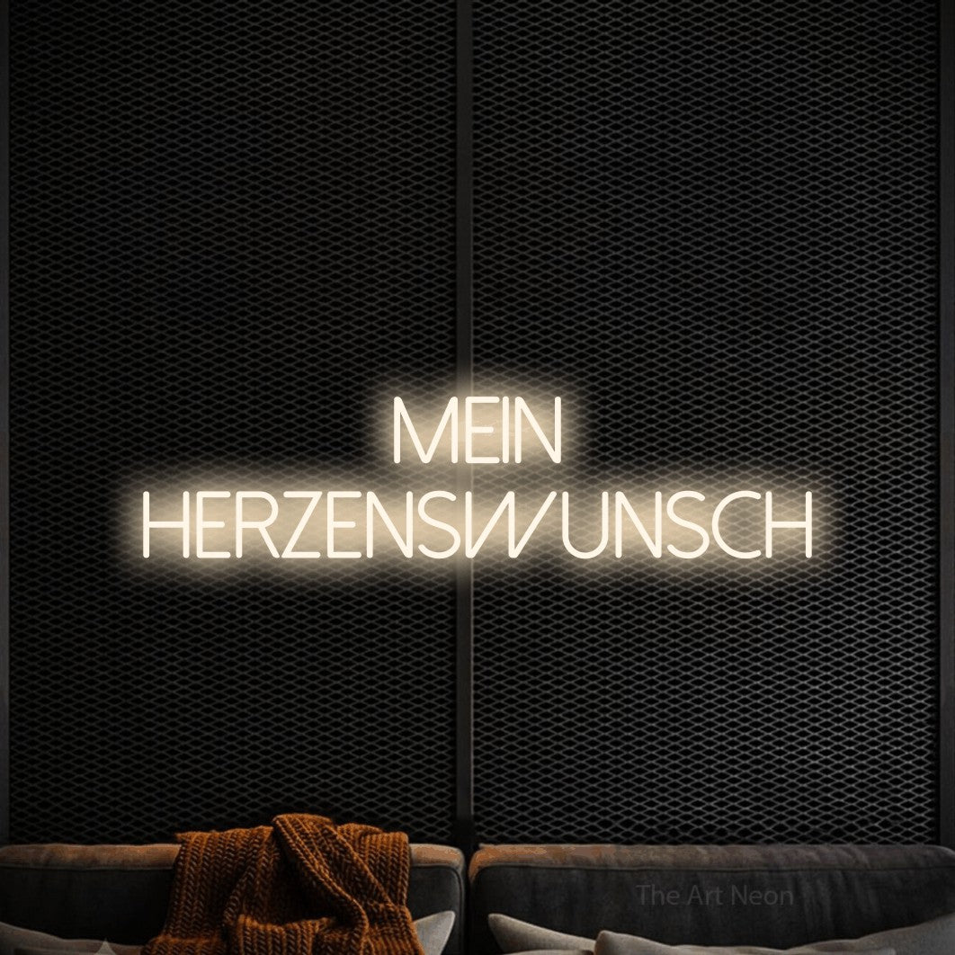 LED neon sign reading “Mein Herzenswunsch”, arranged in 2 lines.