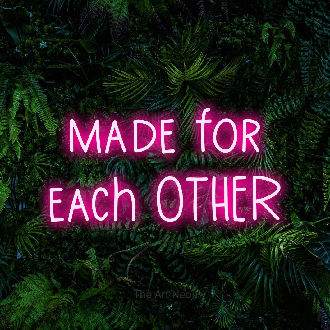 LED neon sign reading “made for each OTHER”, arranged in 2 lines.