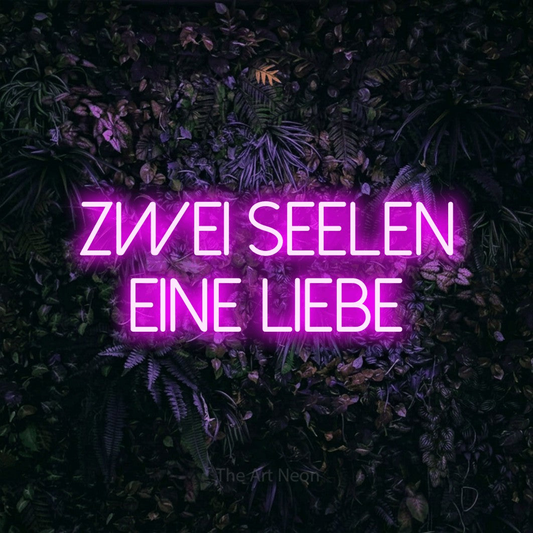 LED neon sign reading “Zwei Seelen eine Liebe”, arranged in 2 lines.
