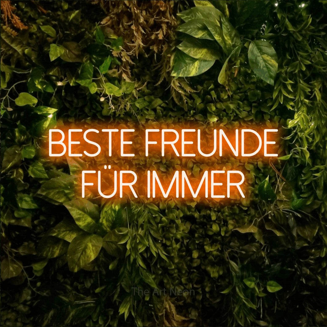 LED neon sign reading “beste freunde für immer”, arranged in 2 lines.