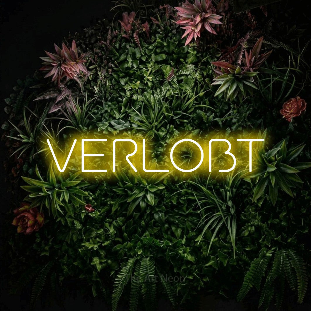 LED neon sign reading “VERLOBT”, arranged in a single line.