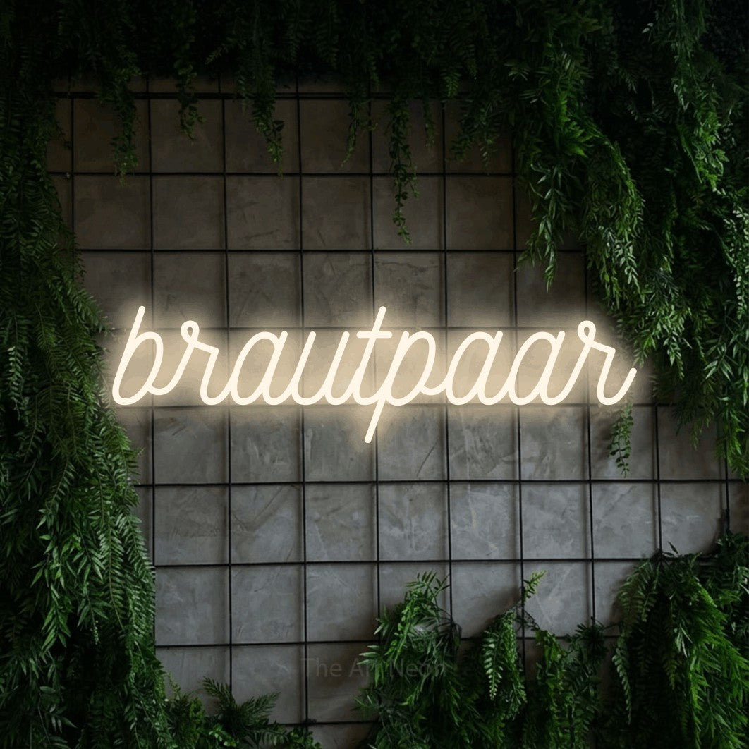 LED neon sign reading “brautpaar”, arranged in a single line.