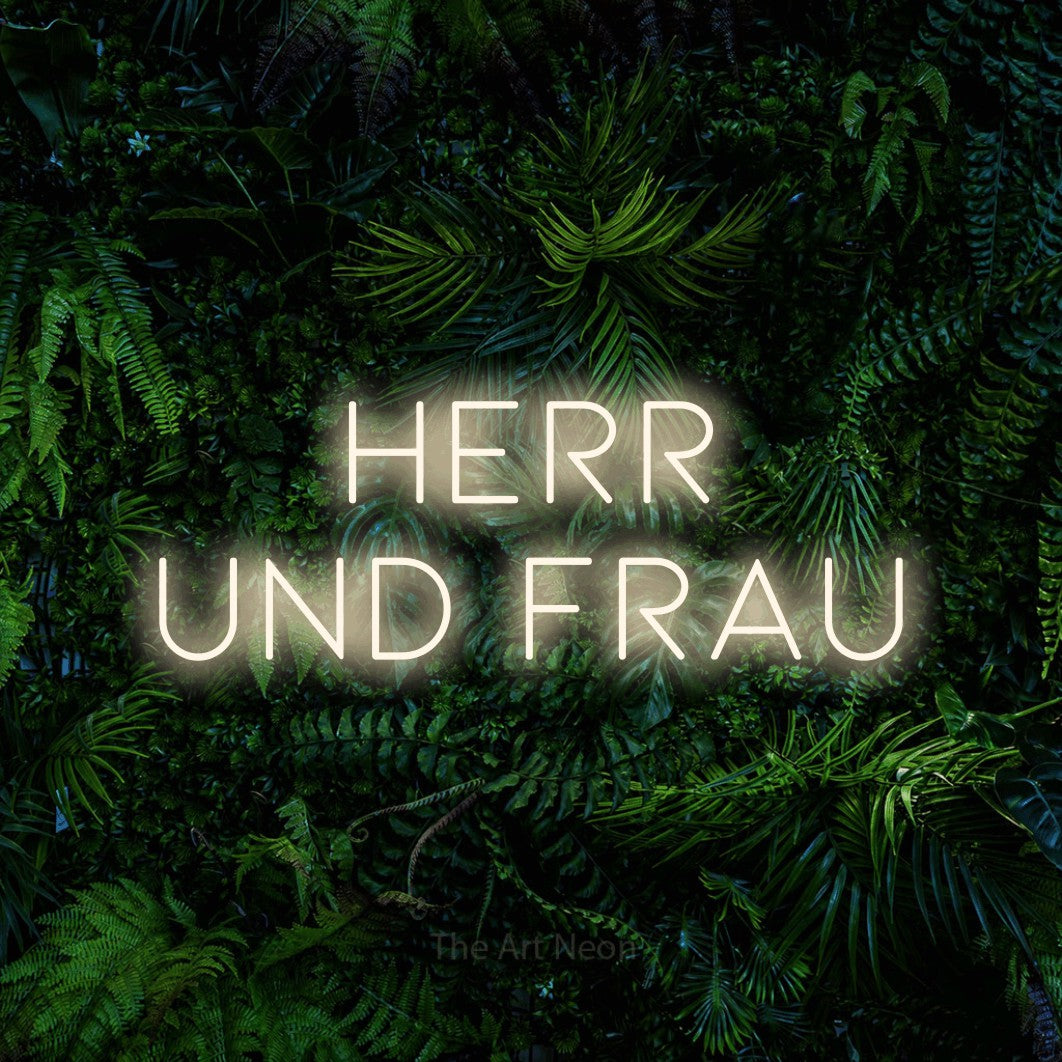 LED neon sign reading “herr und frau”, arranged in 2 lines.