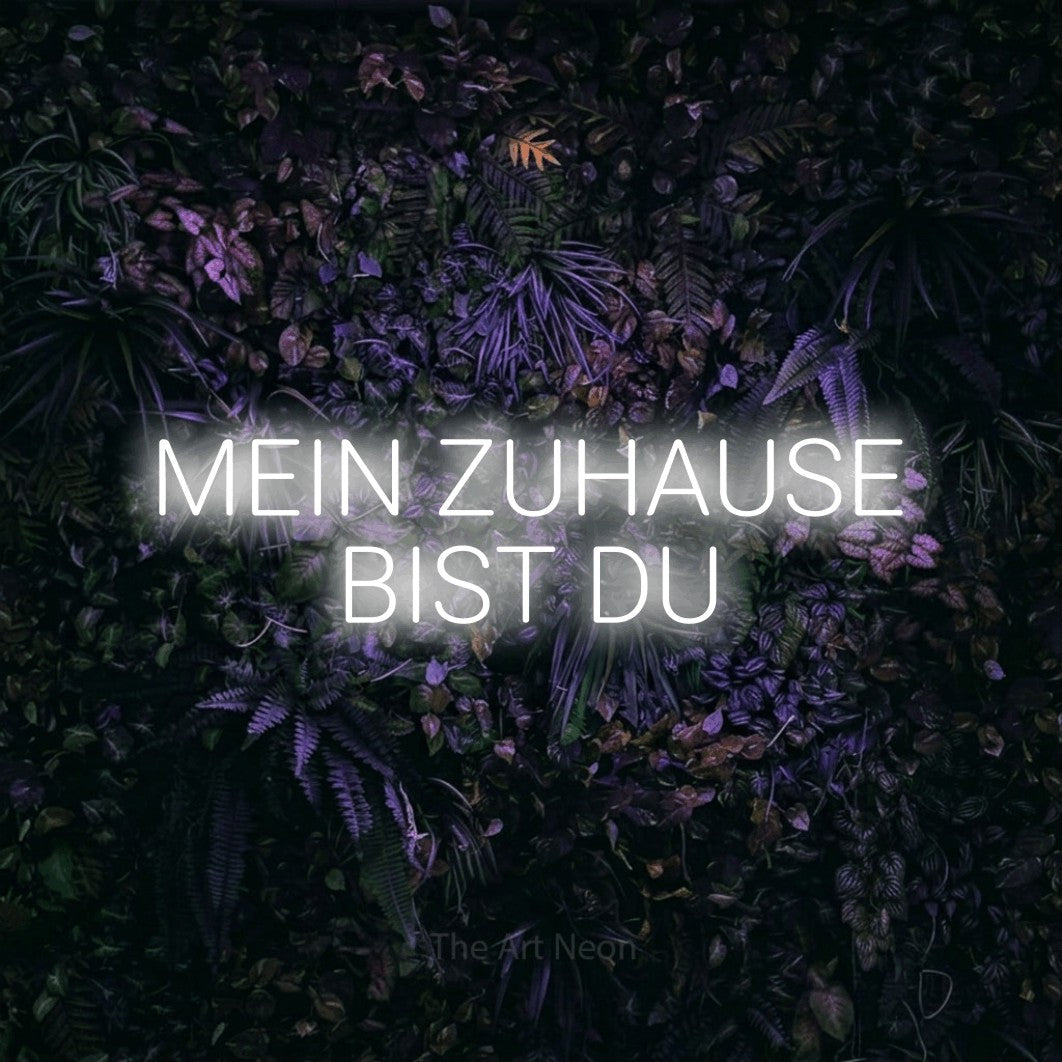 LED neon sign reading “MEIN ZUHAUSE BIST DU”, arranged in 2 lines.
