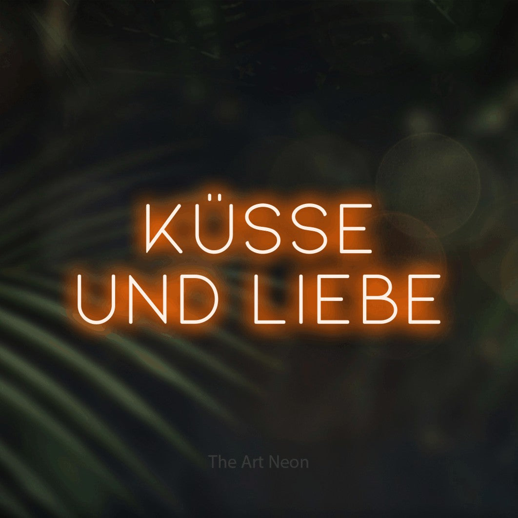 LED neon sign reading “Küsse und Liebe”, arranged in 2 lines.