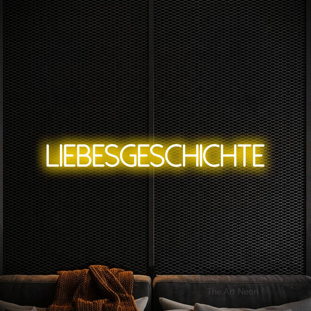 LED neon sign reading “Liebesgeschichte”, arranged in a single line.