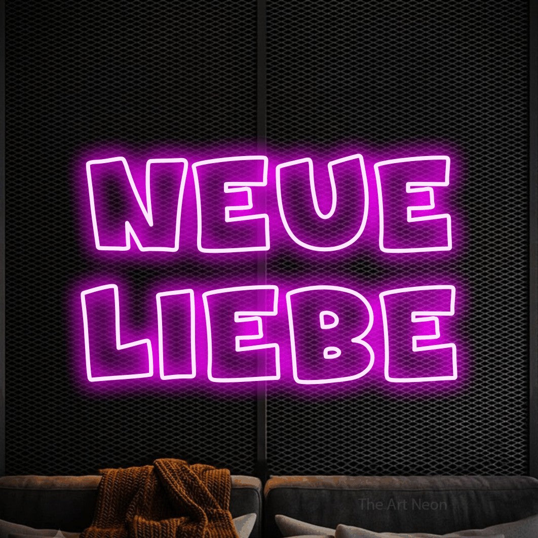 LED neon sign reading “neue liebe”, arranged in 2 lines.