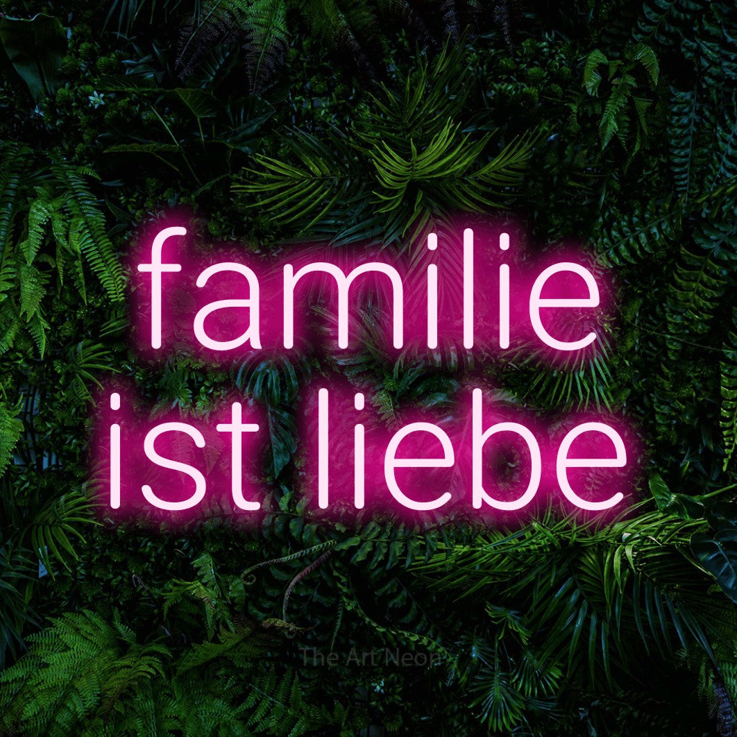 LED neon sign reading “familie ist liebe”, arranged in 2 lines.