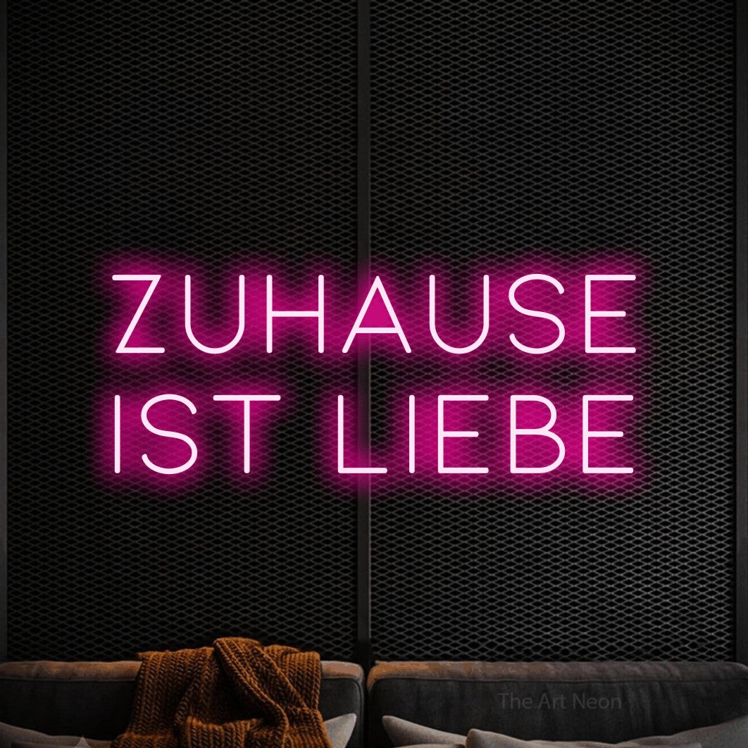 LED neon sign reading “ZUHAUSE ist liebe”, arranged in 2 lines.