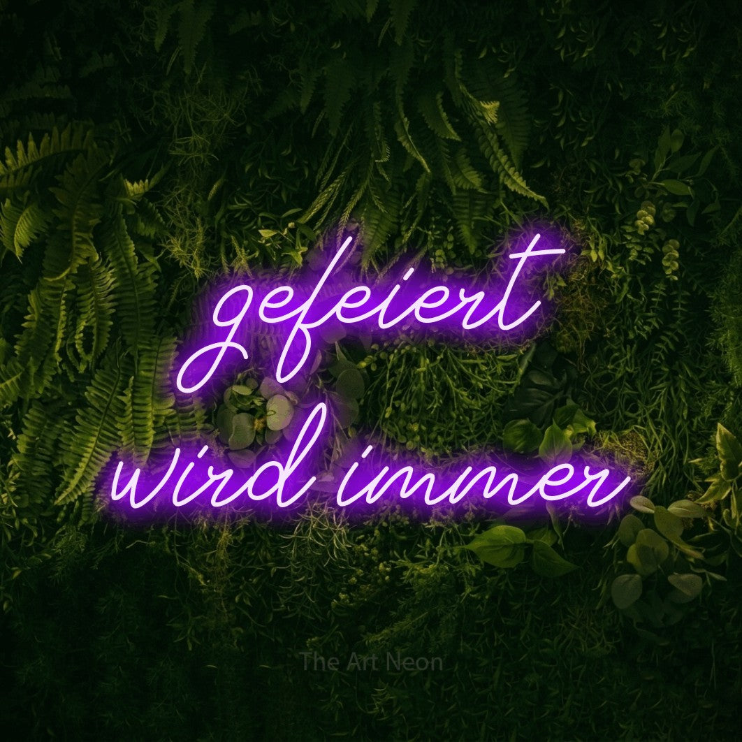 LED neon sign reading “gefeiert wird immer”, arranged in 2 lines.