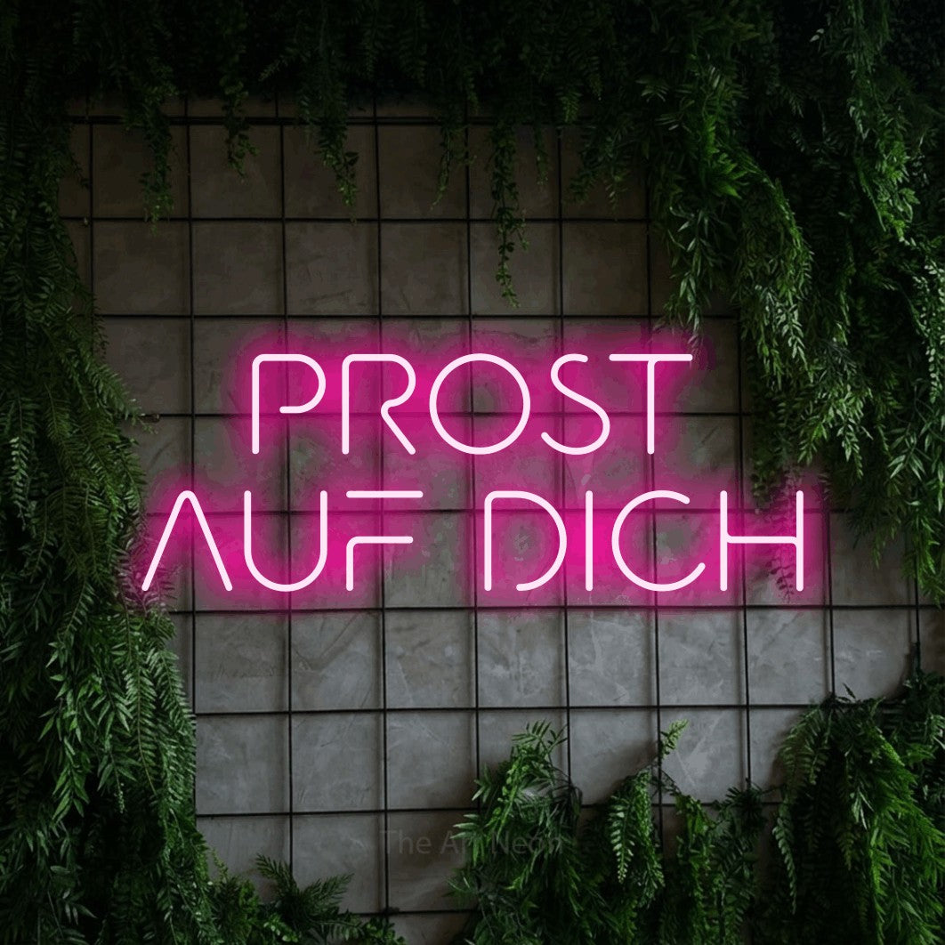 LED neon sign reading “PROST AUF DICH”, arranged in 2 lines.
