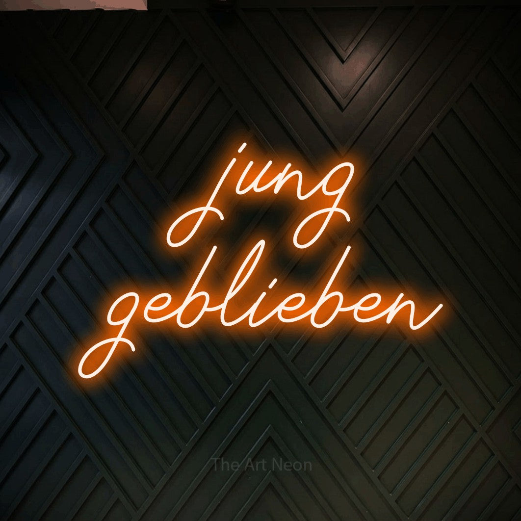 LED neon sign reading “jung geblieben”, arranged in 2 lines.