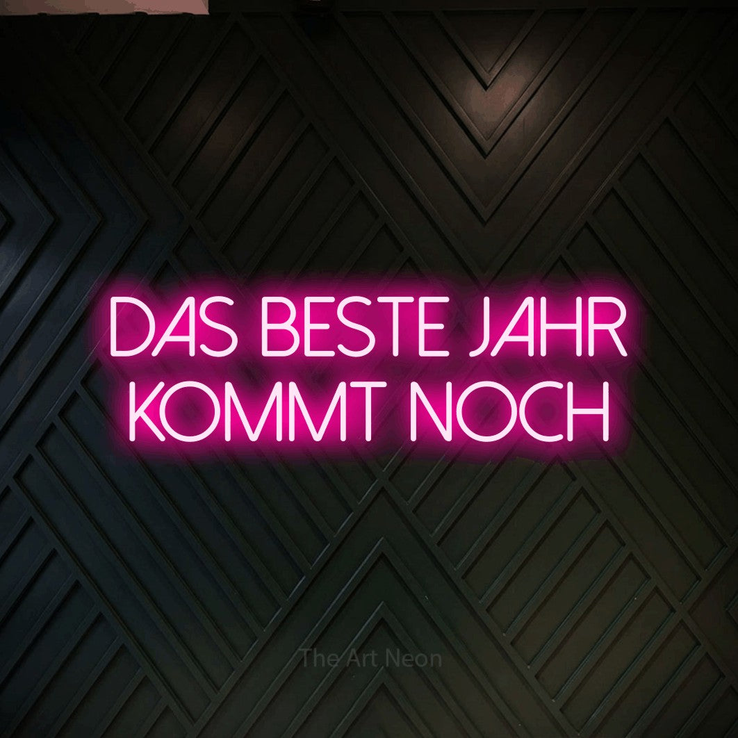 LED neon sign reading “Das beste Jahr kommt noch”, arranged in 2 lines.