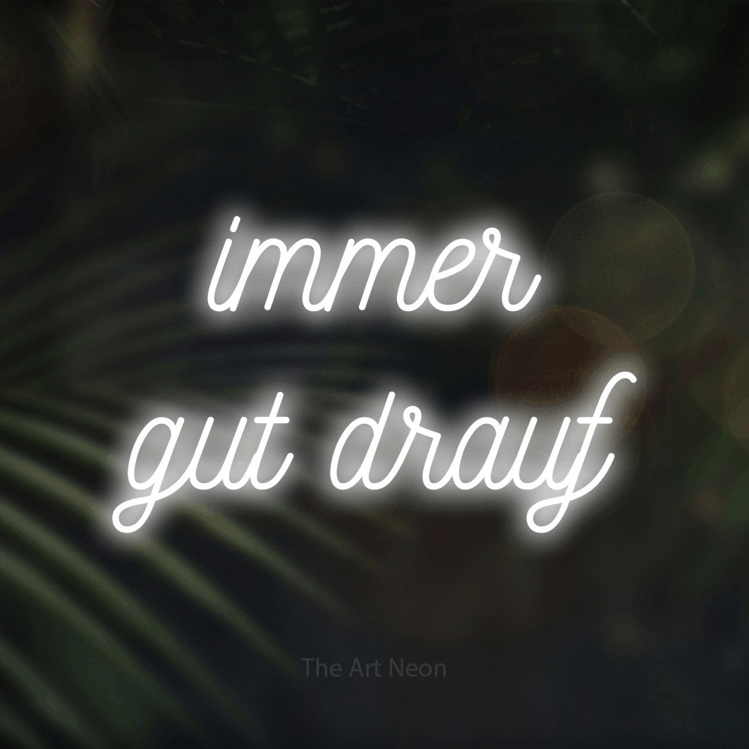 LED neon sign reading “immer gut drauf”, arranged in 2 lines.