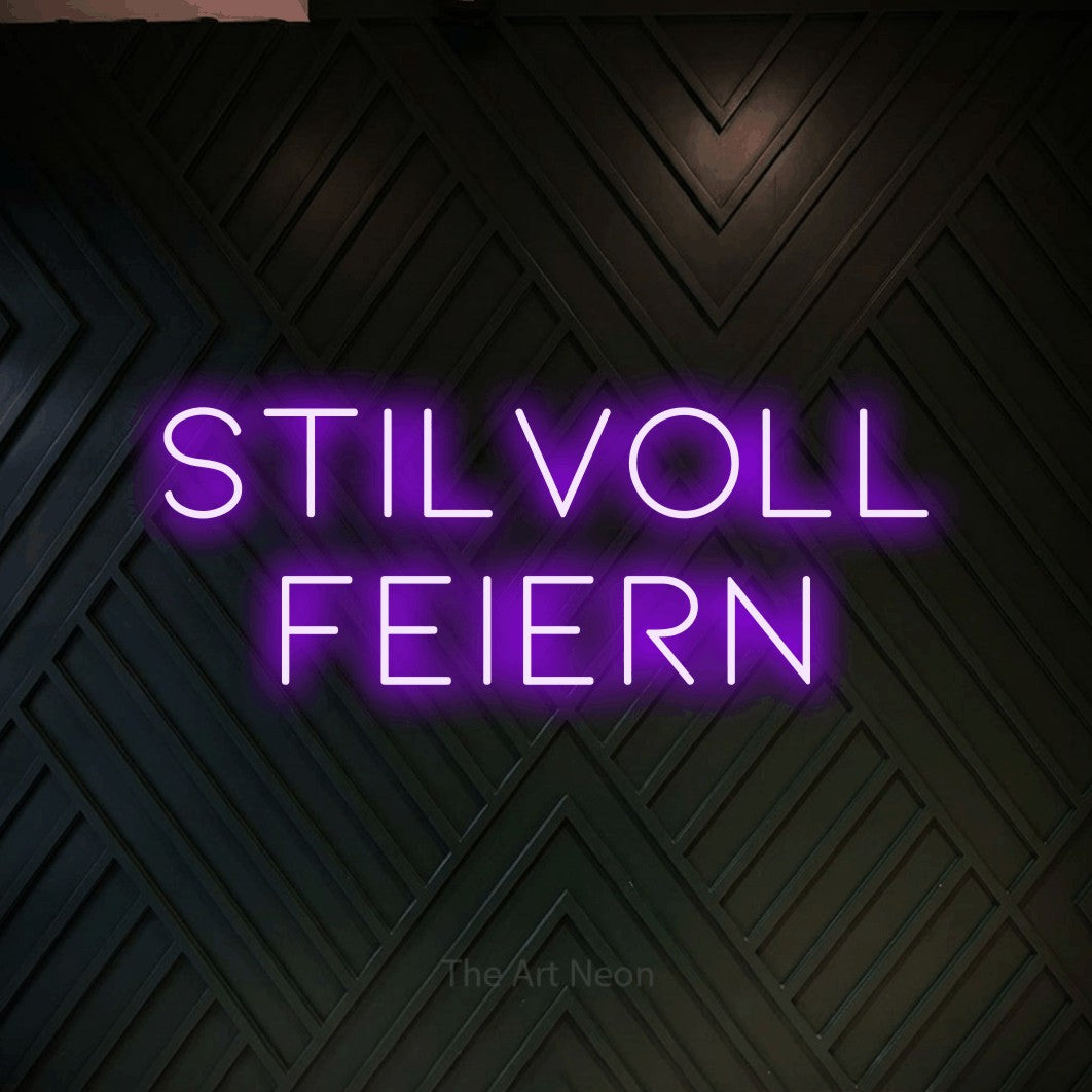 LED neon sign reading “STILVOLL FEIERN”, arranged in 2 lines.