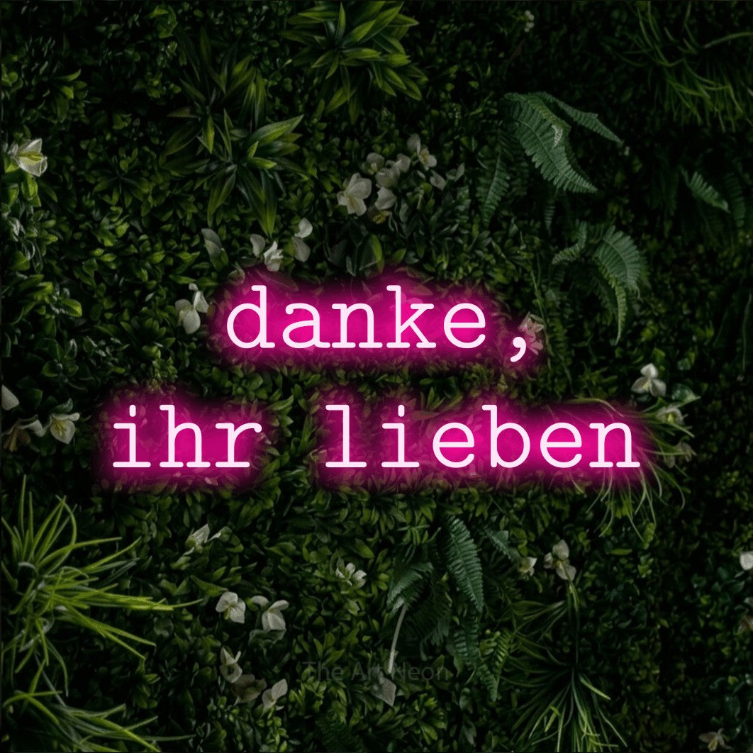 LED neon sign reading “danke, ihr lieben”, arranged in 2 lines.