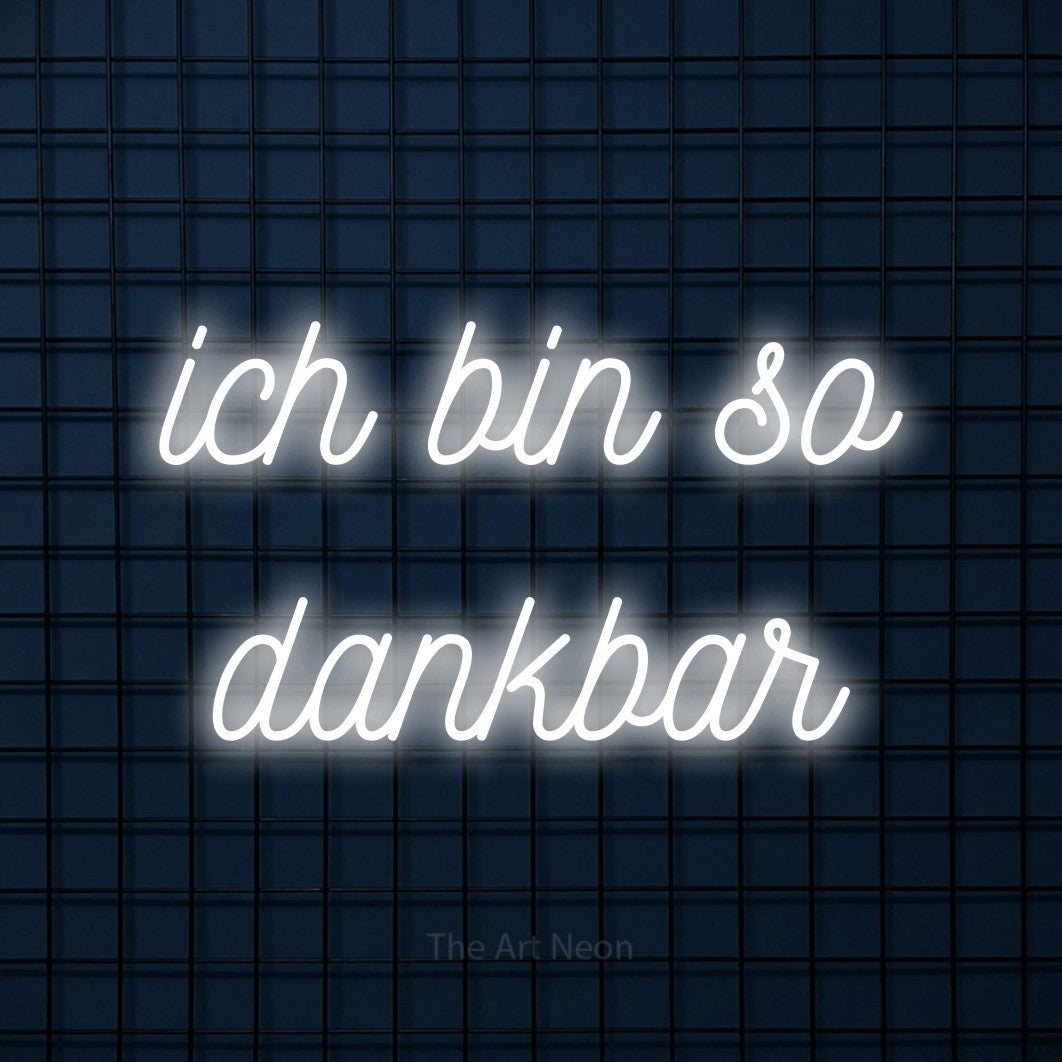 LED neon sign reading “ich bin so dankbar”, arranged in 2 lines.