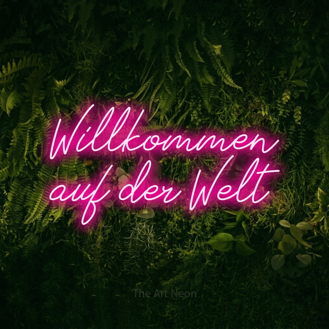 LED neon sign reading “Willkommen auf der Welt”, arranged in 2 lines.